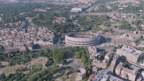 Wide-aerial-rotating-pedestal-shot-of-the-Colosseum-in-Rome,-Italy