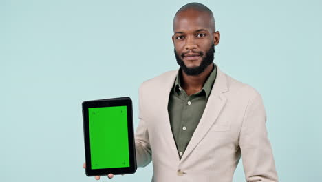 Tablet,-green-screen-and-business-man