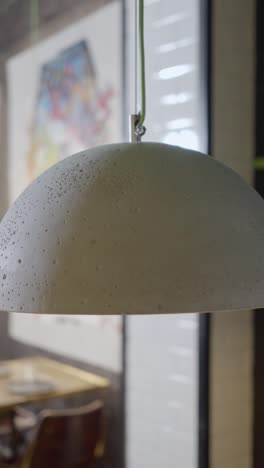 close-up of a textured concrete pendant lamp