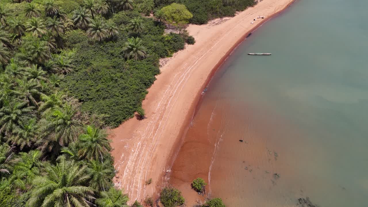 Aerial panorama of Pink Sand Beach in Bijagós Islands, Guinea-Bissau, with vibrant contrast between sand, ocean and sky