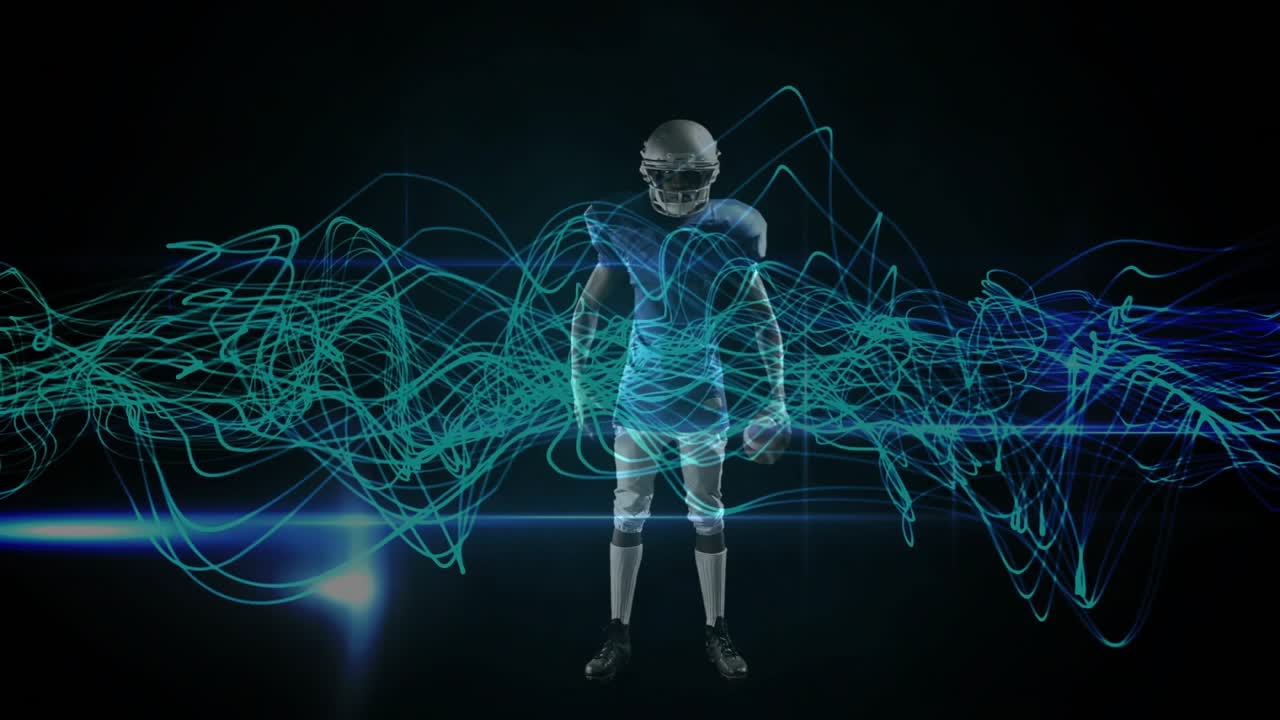 Male athlete entering studio, passing teal waveforms across chest, cradling football preparing play