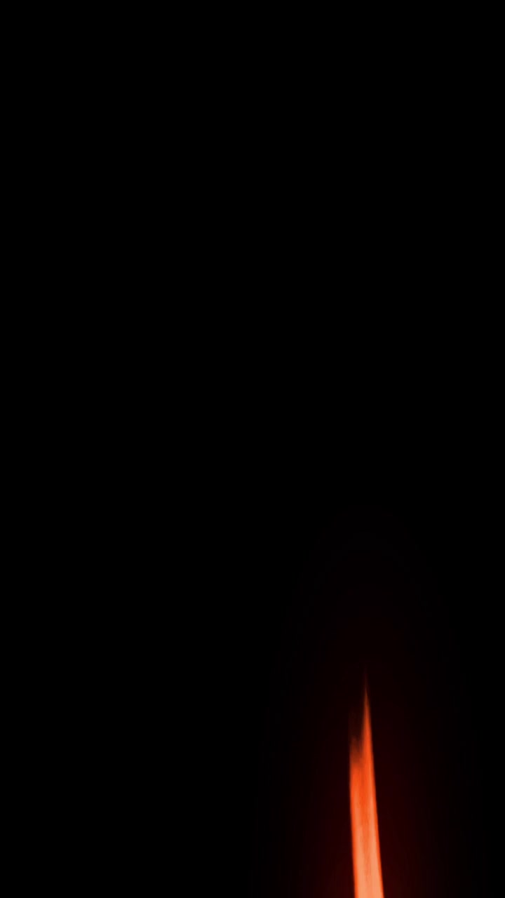 Abstract Light Streaks Moving Against a Dark Background