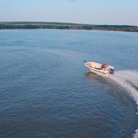 motor boat sails on river