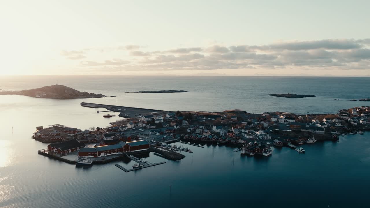 Harbor And Houses In Coastal Town Of Reine On Lofoten Islands In Norway. aerial shot