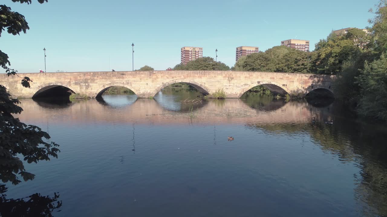 Stone Arch Bridge over Calm River