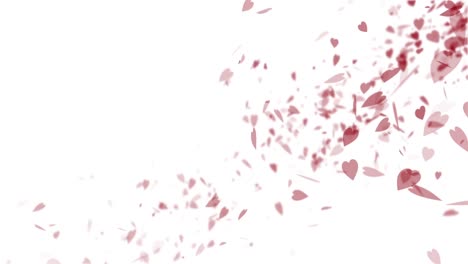 lots of small pink hearts falling across a white background