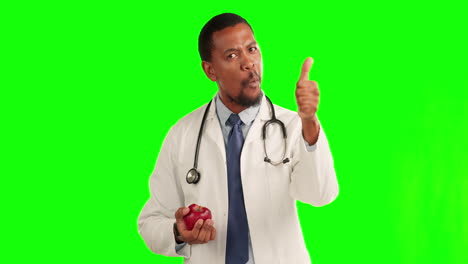 Doctor,-apple-eating-and-green-screen-with-thumbs