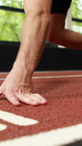 man starting relay running