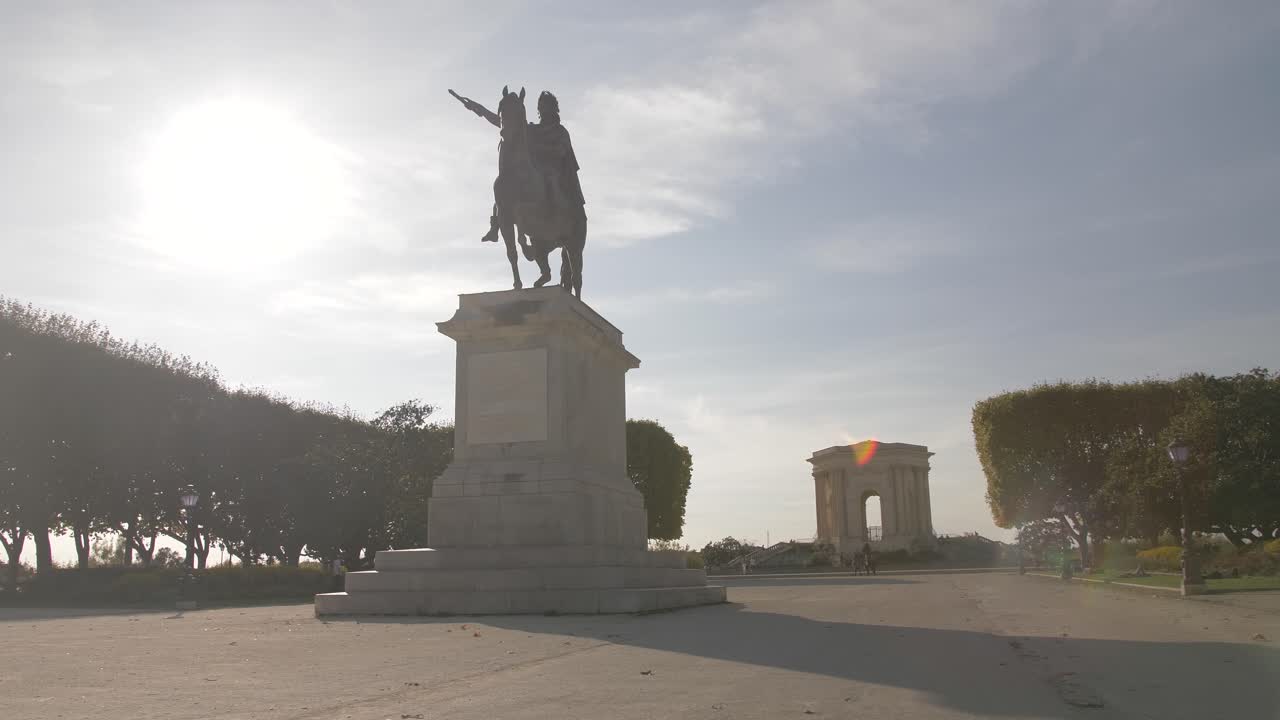 famous place of montpellier with a statue of a knight
