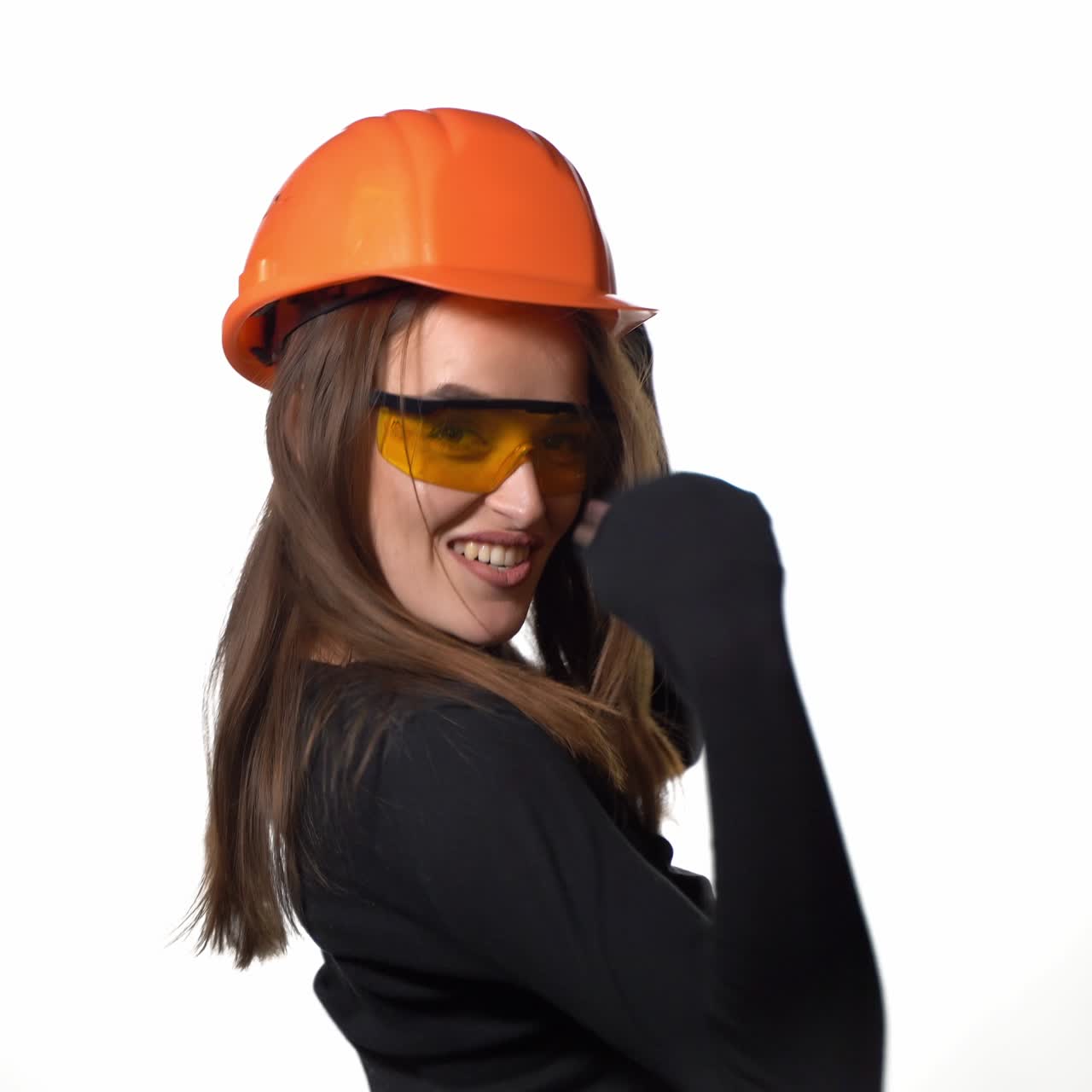 Worker contractor woman. Young woman showing her muscularity. Positive human emotions. Isolated on white background.
