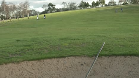 Golf-course-with-group-of-golfers