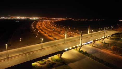 aerial view of highway overpass at night in bahria town karachi