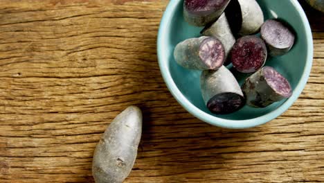 sweet potatoes on wooden table 4k