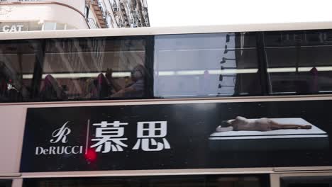 street scene with bus and buildings in hong kong