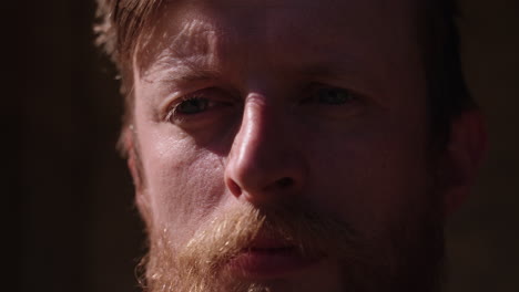 close-up portrait of a man with a beard