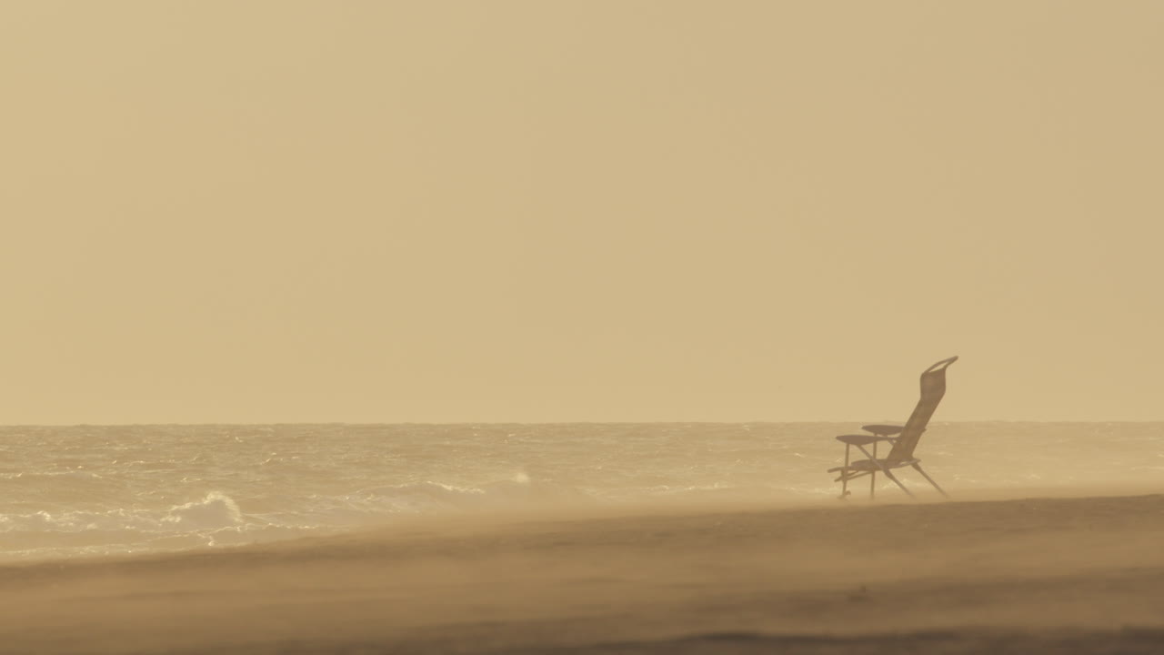 Empty Beach Chair on a Misty Day
