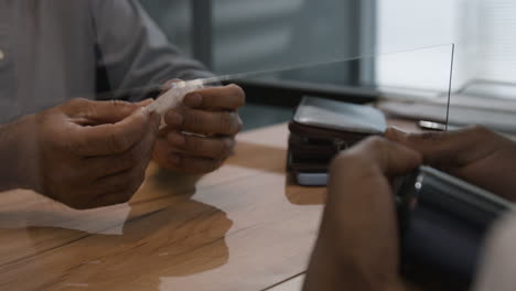 payment transaction with protective screen