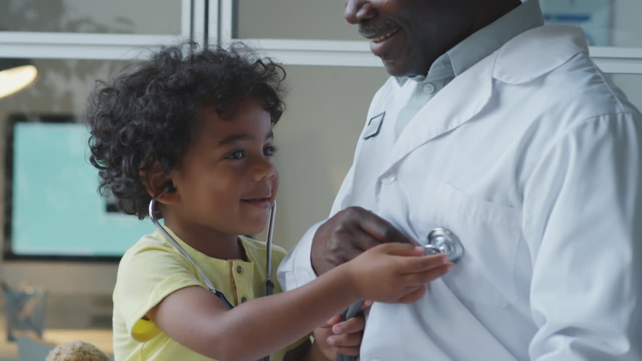 Child playing doctor with a stethoscope