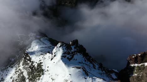 Drone-shot-of-the-steep-edge-of-the-mountain-Pico-Ruivo-in-Madeira