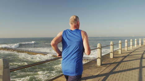 senior man running on the promenade