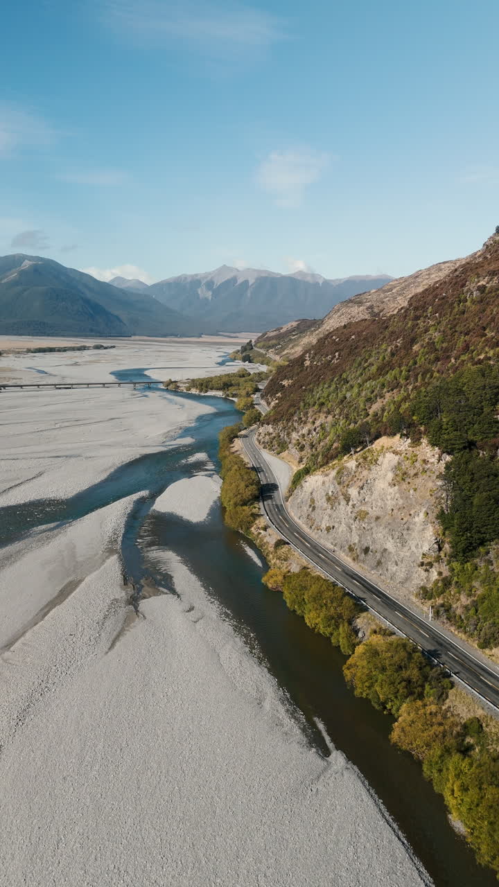 Aerial View of River, Road, and Mountains in New Zealand