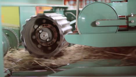 flax fibers at manufacturing line. production line of flax at factory