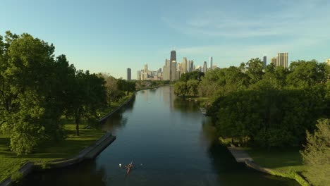 aerial, lincoln park pond with chicago skyline in background