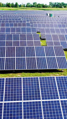 aerial view. top view on blue solar pannels. green energy. pannels on the roof. vertical video