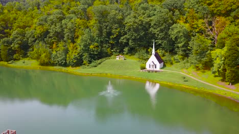 rising aerial over a romantic and beautiful small church in the american wilderness west virginia 1