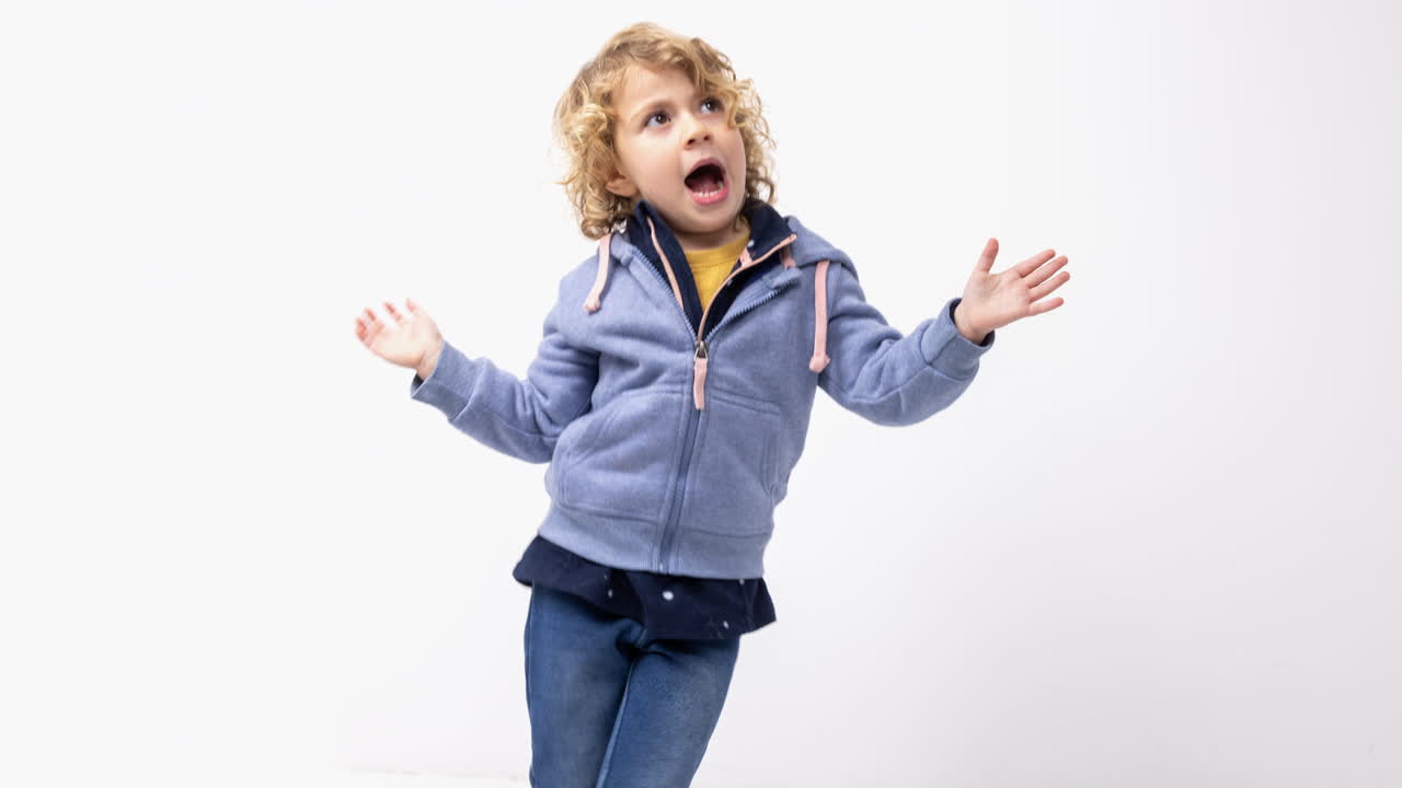 Small girl doing dance moves