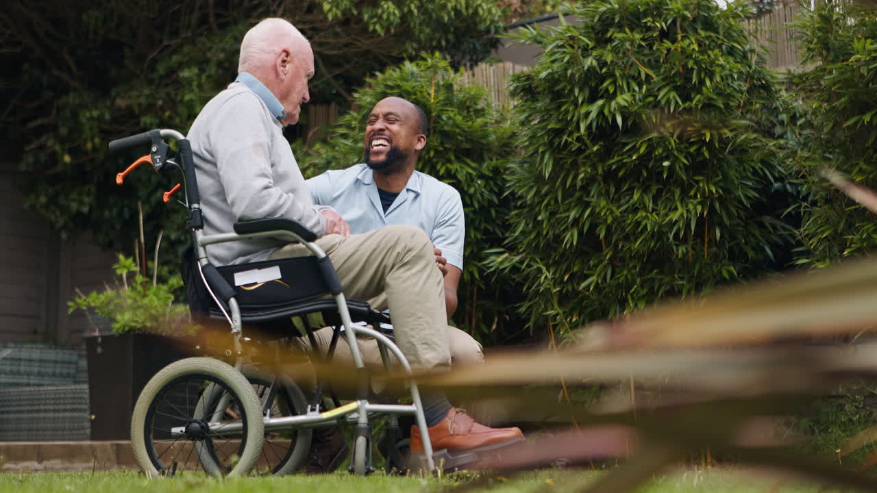Senior Man with Caregiver in Garden