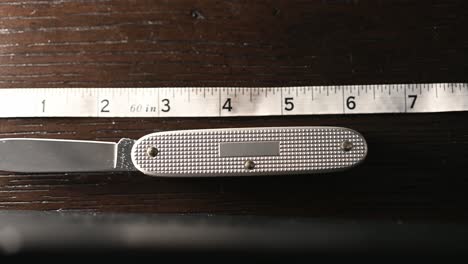 slide over a folding blade gentlemen's pocket knife