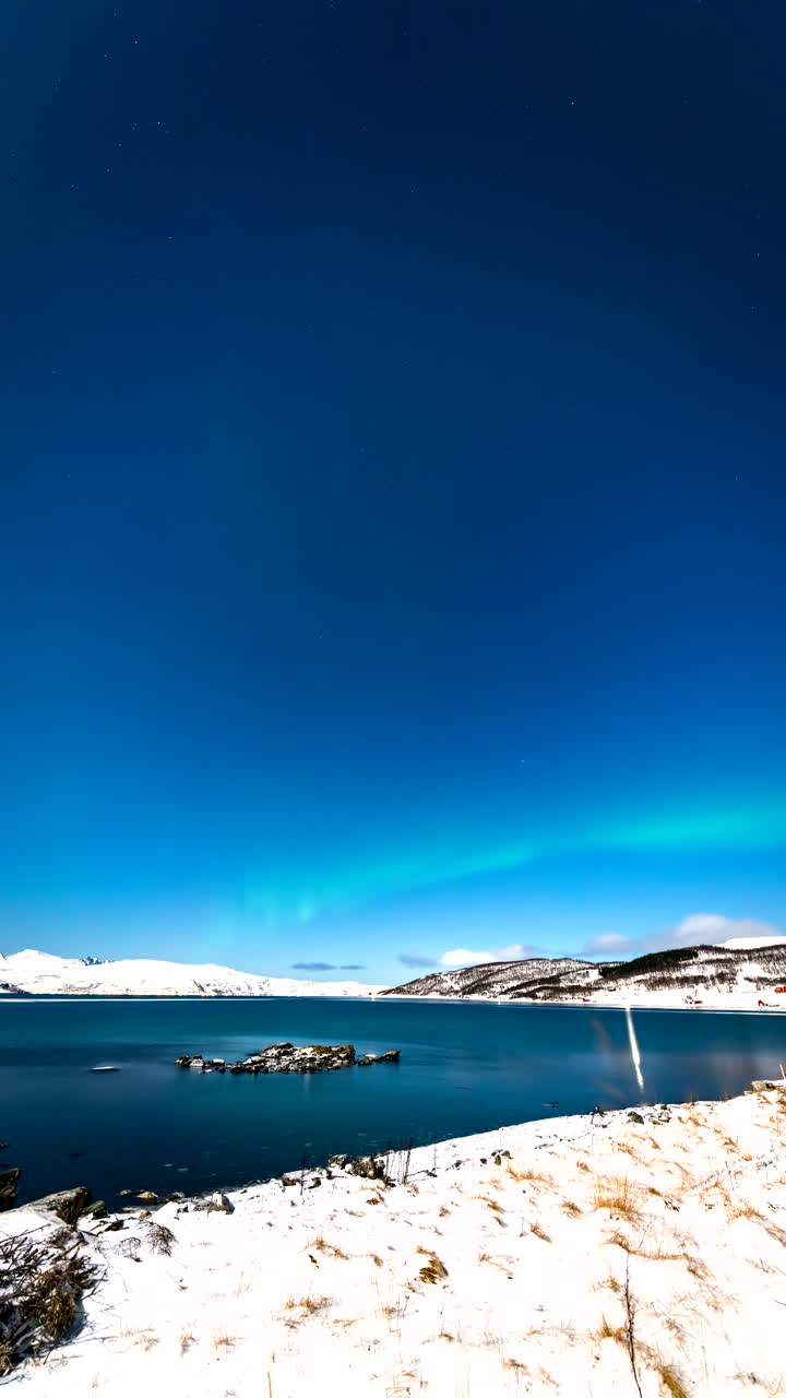 Vertical View Skogsfjord Near Rural Village With Aurora Borealis In Norway. Timelapse
