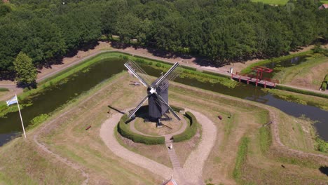 orbit shot of windmill at fortress bourtange groningen, aerial