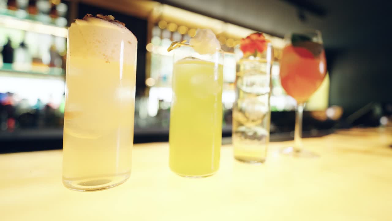 Colorful Cocktails on a Bar Counter with Rack Focus