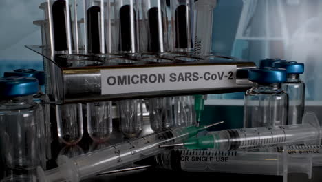 omicron sars-cov-2 test tube samples being removed from rack.  slow zoom out