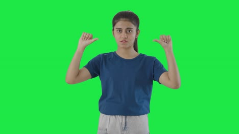 Disappointed-Indian-teenage-girl-showing-thumbs-down-Green-screen