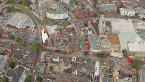 pan down aerial shot over watford town high street