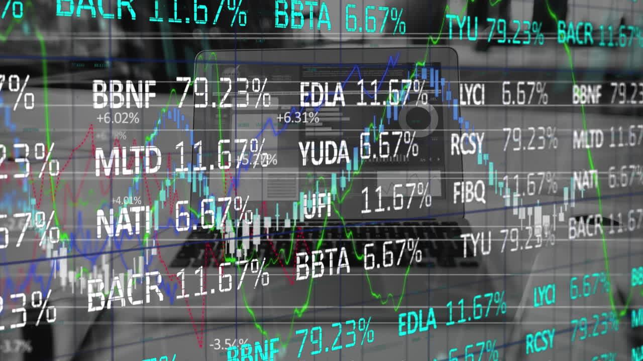 Digital composite video of stock market data processing against laptop on office desk