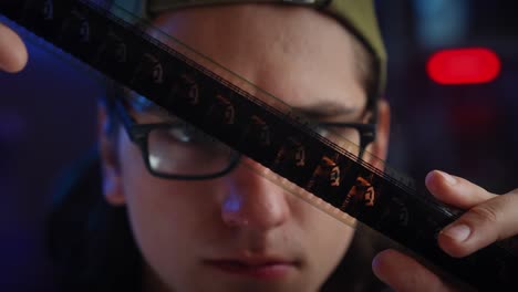 close-up of a person looking at film