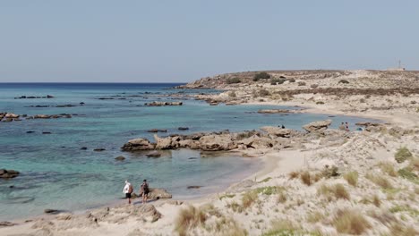 wild sandy beaches of crete island, aerial fly over view