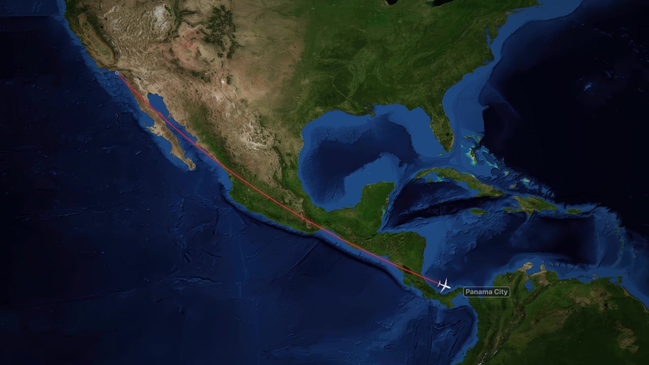 Animação de mapa de satélite acompanhando uma rota de voo de Los Angeles para a Cidade do Panamá.
