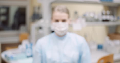 Scientist-Wearing-Protective-Mask-At-Laboratory-3