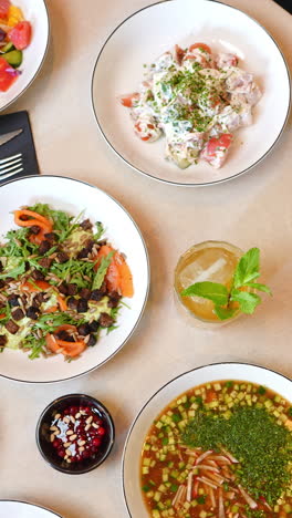 restaurant table with diverse dishes
