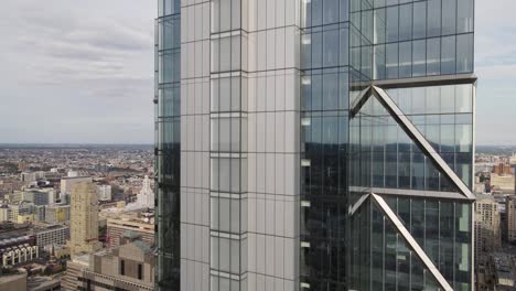 drone panning up philadelphia comcast building - 4k