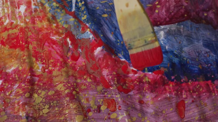 Video of close up of brush and artist painting