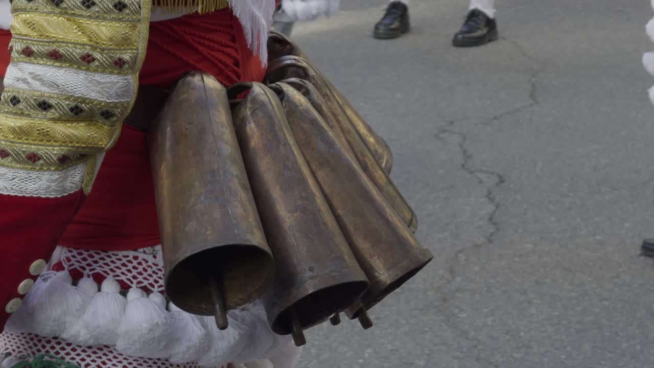 Weathered Long Bells On A Traditional Galician Carnival Colourful Suit