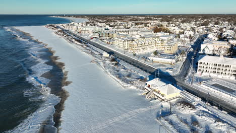 atlantic ocean beach covered in winter snow