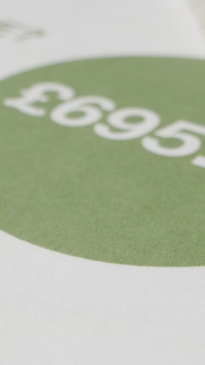 Close Up Vertical Video Of UK Bill Rise In Cost Of Living