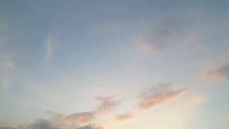 late afternoon sky in jakarta pan down onto city buildings